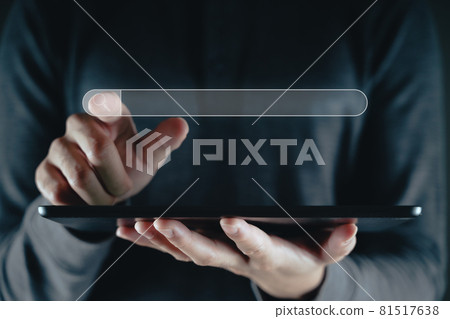 Man using a tablet to Searching for information with the Search bar, Web browser, Data Search, Search Engine, Technology Concept 81517638