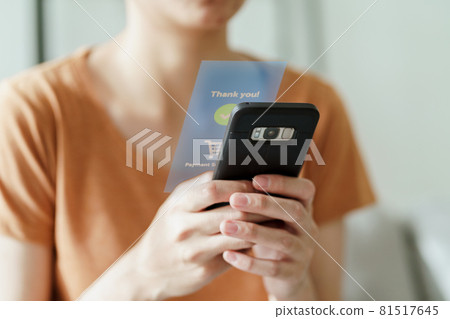 Young woman using smart phone for online shopping, internet banking, e-commerce, spending money, working from home concept Young woman using smart phone for online shopping, internet banking, e-commerce, spending money, working from home concept 81517645
