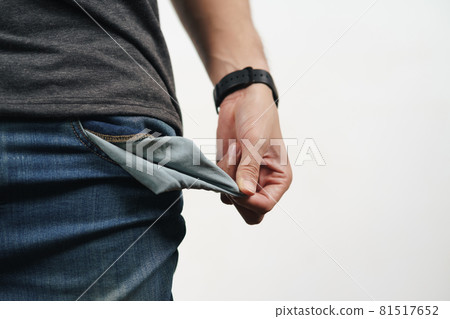 Man turning out the jean pocket to showing empty pocket. bankrupt, bad economy, no money concept. Man turning out the jean pocket to showing empty pocket. bankrupt, bad economy, no money concept. 81517652