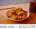 Fried dumplings at a Chinese Shangri-La stall 81521259