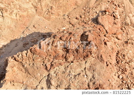 Land structure in open pit mining. Ground background in quarry. Rock texture during earthworks.  81522225