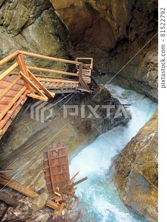 steep stairs along waterfall and rocks in austria steep stairs along waterfall and rocks in austria 81522792