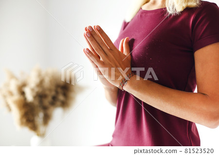 Calm caucasian blonde lady practicing yoga at home in anjaney crescent lunge asana position Calm caucasian blonde lady practicing yoga at home in anjaney crescent lunge asana position 81523520