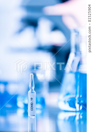 Bottle of COVOD-19 vaccine sample in a laboratory. Idea for researching and lab tests for coronavirus curing. 81525904