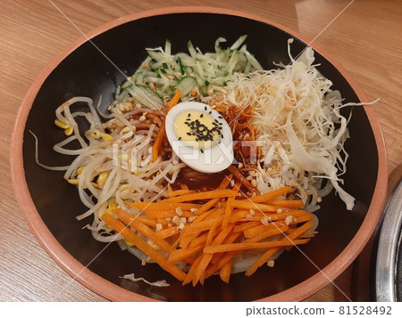 A bowl of spicy chewy noodles A bowl of spicy chewy noodles 81528492
