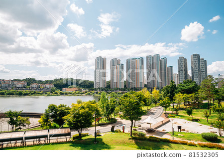 View of modern buildings and Gwanggyo Lake Park in Suwon, Korea 81532305
