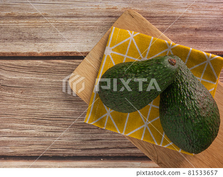 avocado on wood table top view image for food concept. avocado on wood table top view image for food concept. 81533657