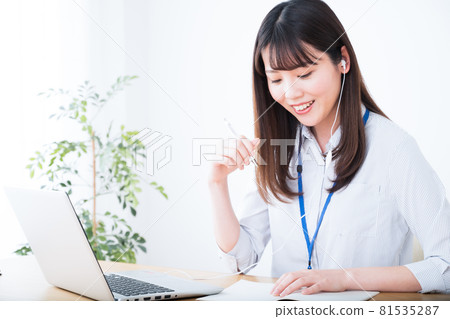 Woman in an online meeting on telework Woman in an online meeting on telework 81535287