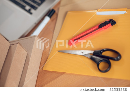 Set of materials on the desk prepared for packing goods Set of materials on the desk prepared for packing goods 81535288