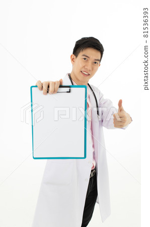 Asian male doctor holding and thumbs up for blank medical chart 81536393