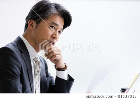 Businessman in desk work Businessman in desk work 81537015