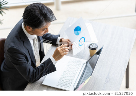 Businessman in desk work Businessman in desk work 81537030