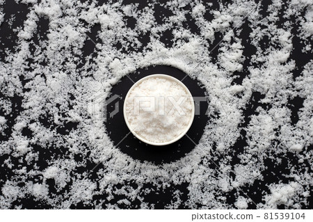White salt on dark background. White salt on dark background. 81539104