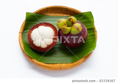 Mangosteen in bamboo basket on white background. 81539167