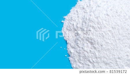 Baking soda on blue background. Baking soda on blue background. 81539172