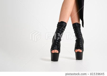 Female legs in pole dance boots 81539645