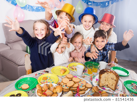 satisfied kids having a good time at a birthday party satisfied kids having a good time at a birthday party 81541436