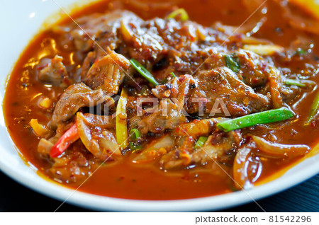 stir fried pork with red curry or stir fried beef 81542296