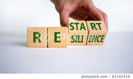 Restart and resilience symbol. Businessman turns cubes and changes the word 'restart' to 'resilience'. Beautiful white background. Business and restart - resilience concept. Copy space. Restart and resilience symbol. Businessman turns cubes and changes the word 'restart' to 'resilience'. Beautiful white background. Business and restart - resilience concept. Copy space. 81542419