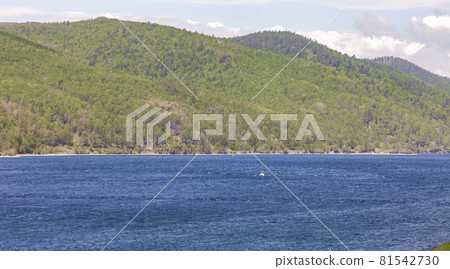 Source of the Angara River with Shaman stone on summer June day. 81542730