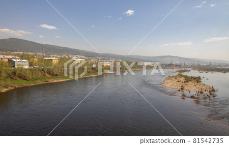 Landscape with the Lena River in the city of Ust-Kut on summer June day. Landscape with the Lena River in the city of Ust-Kut on summer June day. 81542735