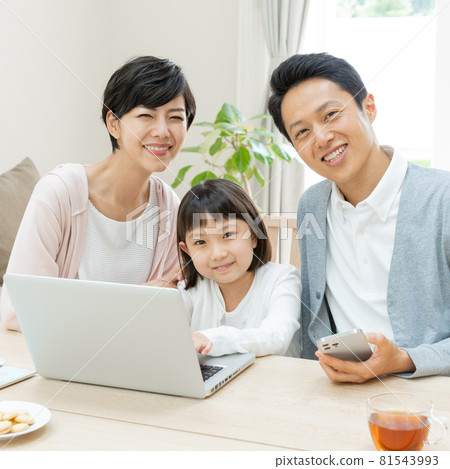 Portrait of a family of three, an elementary school girl, dad, and mom Square 81543993