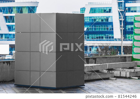 A sample of facade materials at a construction site against the background of modern city buildings with snow in winter A sample of facade materials at a construction site against the background of modern city buildings with snow in winter 81544246