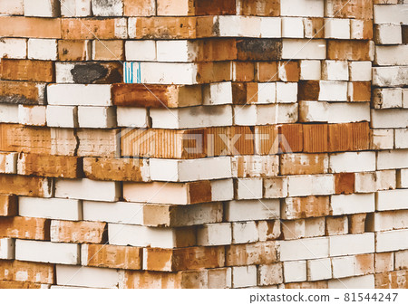 Heap of old white and brown bricks texture background Heap of old white and brown bricks texture background 81544247