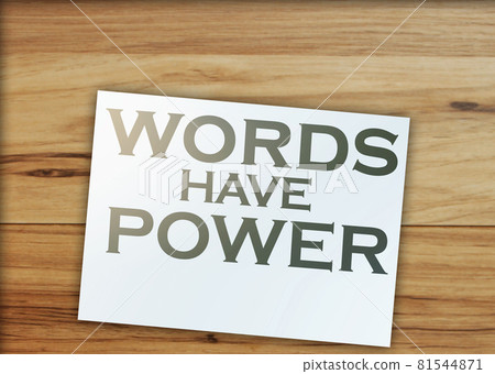 Words have power text on page and paper dollar signs around on wooden table. Copywritting storytelling marketing concept Words have power text on page and paper dollar signs around on wooden table. Copywritting storytelling marketing concept 81544871