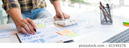 business man financial inspector and secretary making report and brainstorming with colleague in a modern co-working space business man financial inspector and secretary making report and brainstorming with colleague in a modern co-working space 81549376