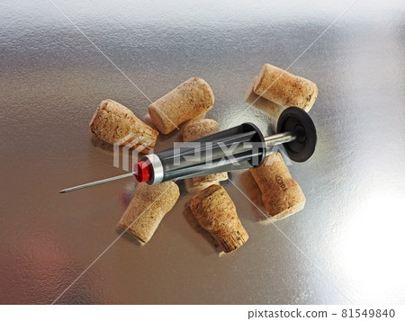 With a wine cork and an opener silver back With a wine cork and an opener silver back 81549840