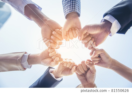 Diverse multiethnic Partners hands together teamwork group of multi racial people meeting join hands togetherness. Diversity people hands join empower partnership teams connection volunteer community 81550626