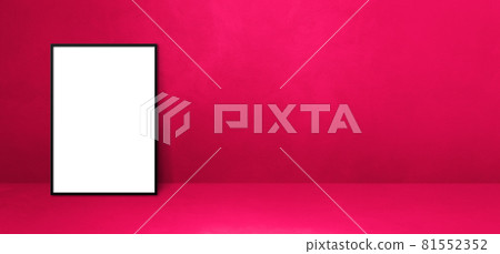Black picture frame leaning on a pink wall. Horizontal banner 81552352