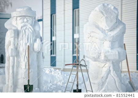 Christmas and new year figures made of snow: Santa Claus and snow maiden Christmas and new year figures made of snow: Santa Claus and snow maiden 81552441
