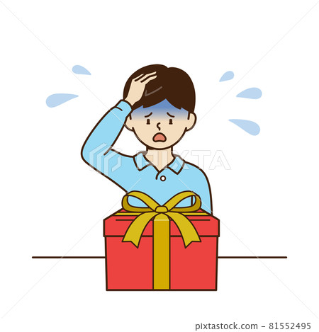A boy holding his head in front of a present 81552495