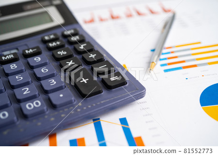 Calculator on graph paper. Finance development, Banking Account, Statistics, Investment Analytic research data economy, Stock exchange trading, Business company concept. Calculator on graph paper. Finance development, Banking Account, Statistics, Investment Analytic research data economy, Stock exchange trading, Business company concept. 81552773