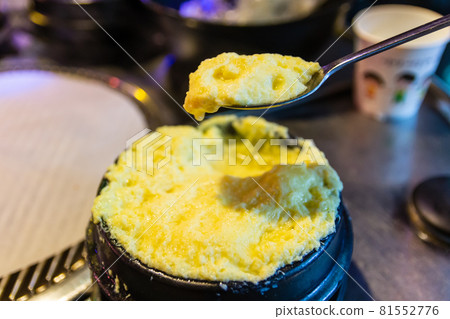 Steamed egg in earthenware Steamed egg in earthenware 81552776