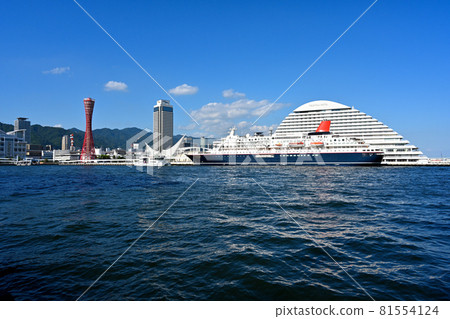 Summer 2021 Kobe Port cruise ship "Nippon Maru" and port towers and hotels 81554124