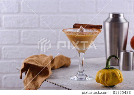 Creamy pumpkin martini cocktail or liquor Creamy pumpkin martini cocktail or liquor 81555428