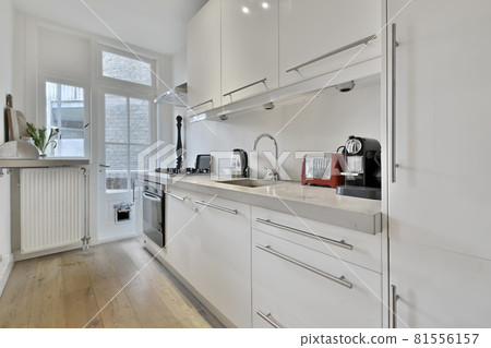 Beautiful and spacious kitchen in an elegant home 81556157