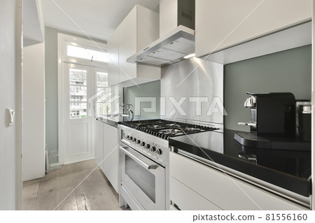 Beautiful and spacious kitchen in an elegant home Beautiful and spacious kitchen in an elegant home 81556160