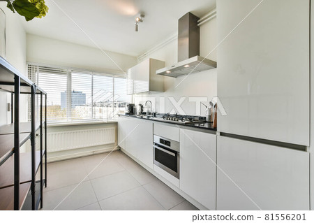 Beautiful and spacious kitchen in an elegant home 81556201