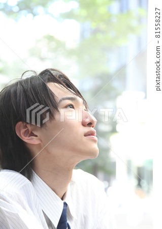 A young man watching over A young man watching over 81558227