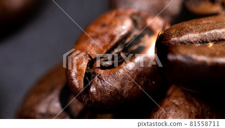 Close up of a coffee bean. Macro photography of coffee beans in high resolution. Very detailed sharp ultra macro on a roasted coffee bean. Microscopic photography. Perfect desktop background picture Close up of a coffee bean. Macro photography of coffee beans in high resolution. Very detailed sharp ultra macro on a roasted coffee bean. Microscopic photography. Perfect desktop background picture 81558711