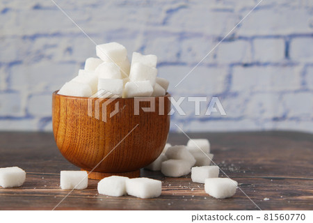 white sugar cube in a container on table  81560770