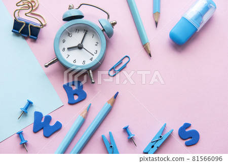 Frame of different stationery on pink background Frame of different stationery on pink background 81566096