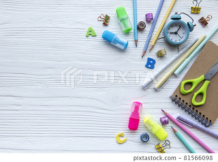Frame of different stationery on white wooden background Frame of different stationery on white wooden background 81566098