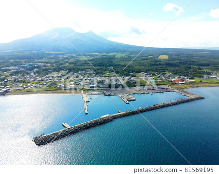 Aerial view of the scenery of Kakeno fishing port in Mori-cho, Hokkaido in summer Aerial view of the scenery of Kakeno fishing port in Mori-cho, Hokkaido in summer 81569195