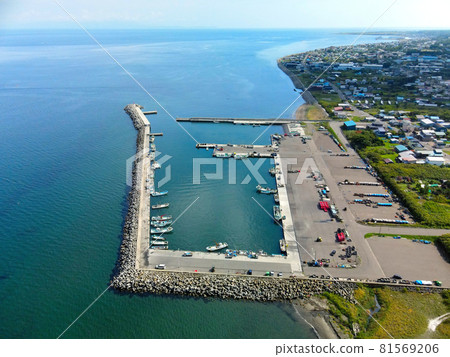 Aerial view of the scenery of Kakeno fishing port in Mori-cho, Hokkaido in summer Aerial view of the scenery of Kakeno fishing port in Mori-cho, Hokkaido in summer 81569206