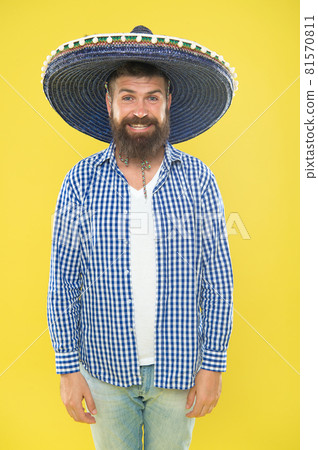 Costume accesory. Bearded man in mexican hat. Mexican  81570811